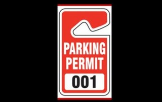 Red and white Parking permit tag with the number 001